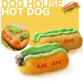 Hot dog shaped dog beds with dogs nestled inside, DOG HOUSE HOT DOG promo graphic