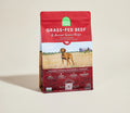 Open Farm grass-fed beef & ancient grains dry dog food bag with a Vizsla in a grassy field